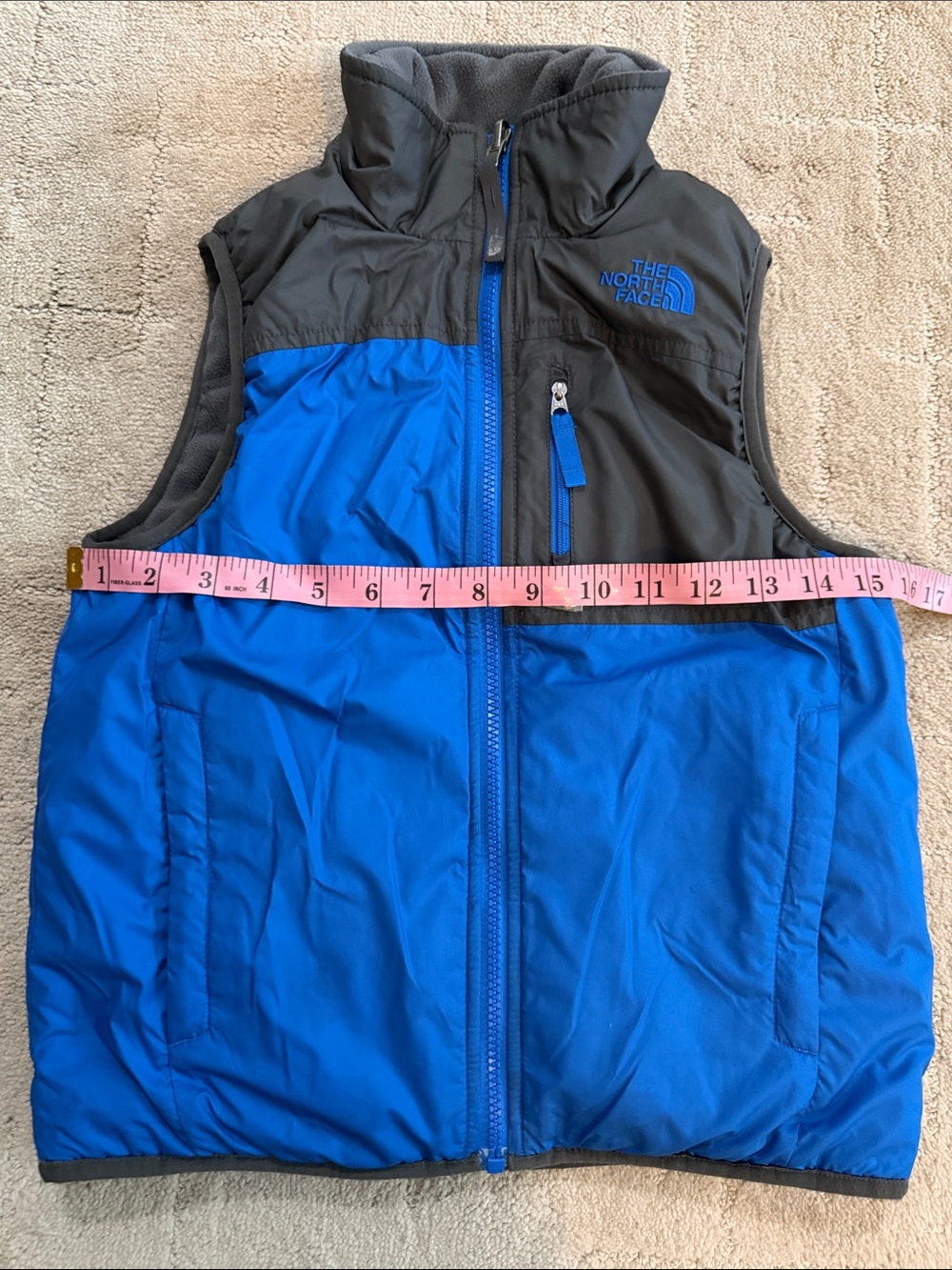 The North Face Boys Blue and Gray Puffer Vest reversible. - Picture 3 of 5